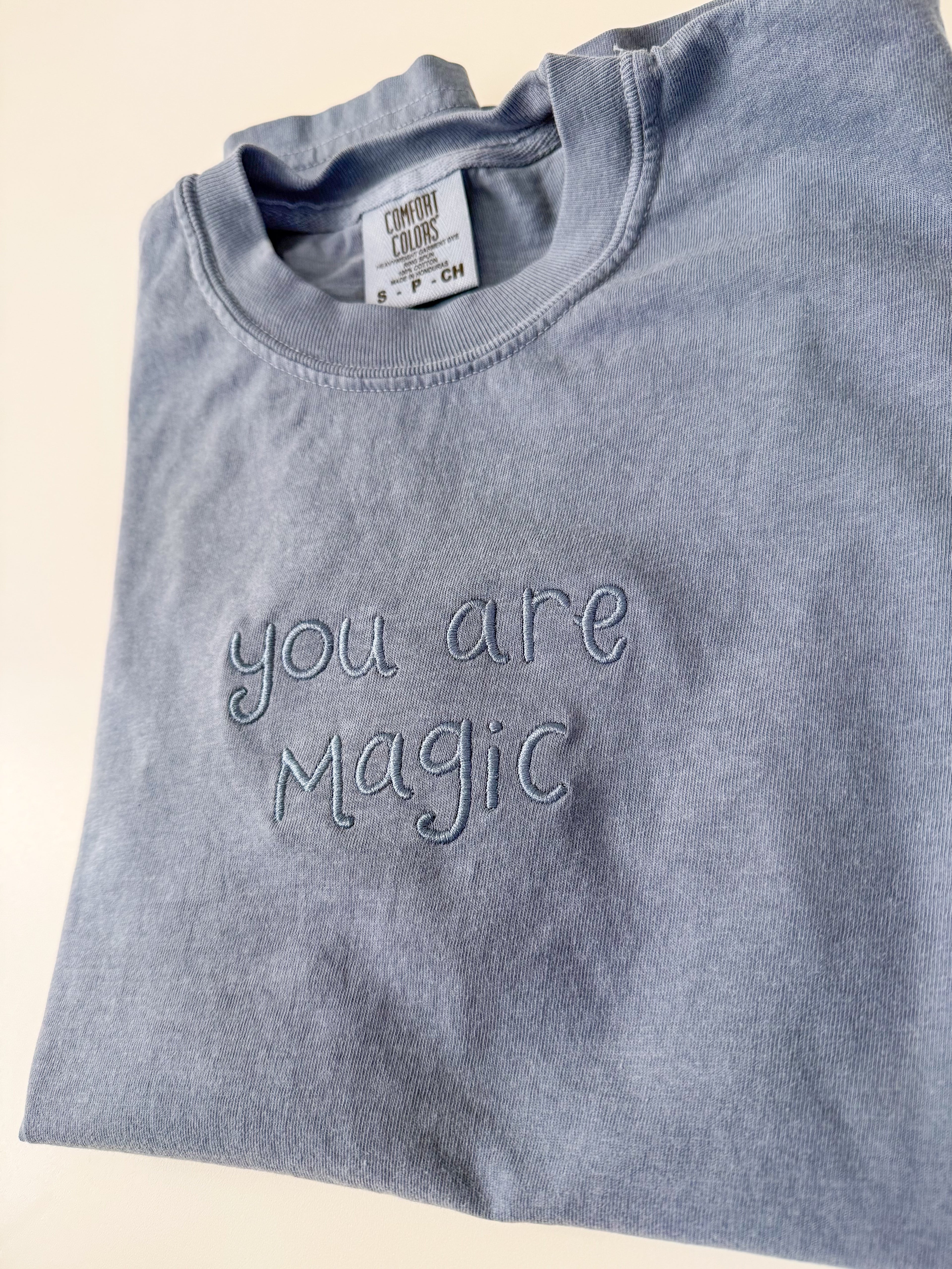 "You Are Magic" Embroidered Blue Jean Unisex Short Sleeve Tee